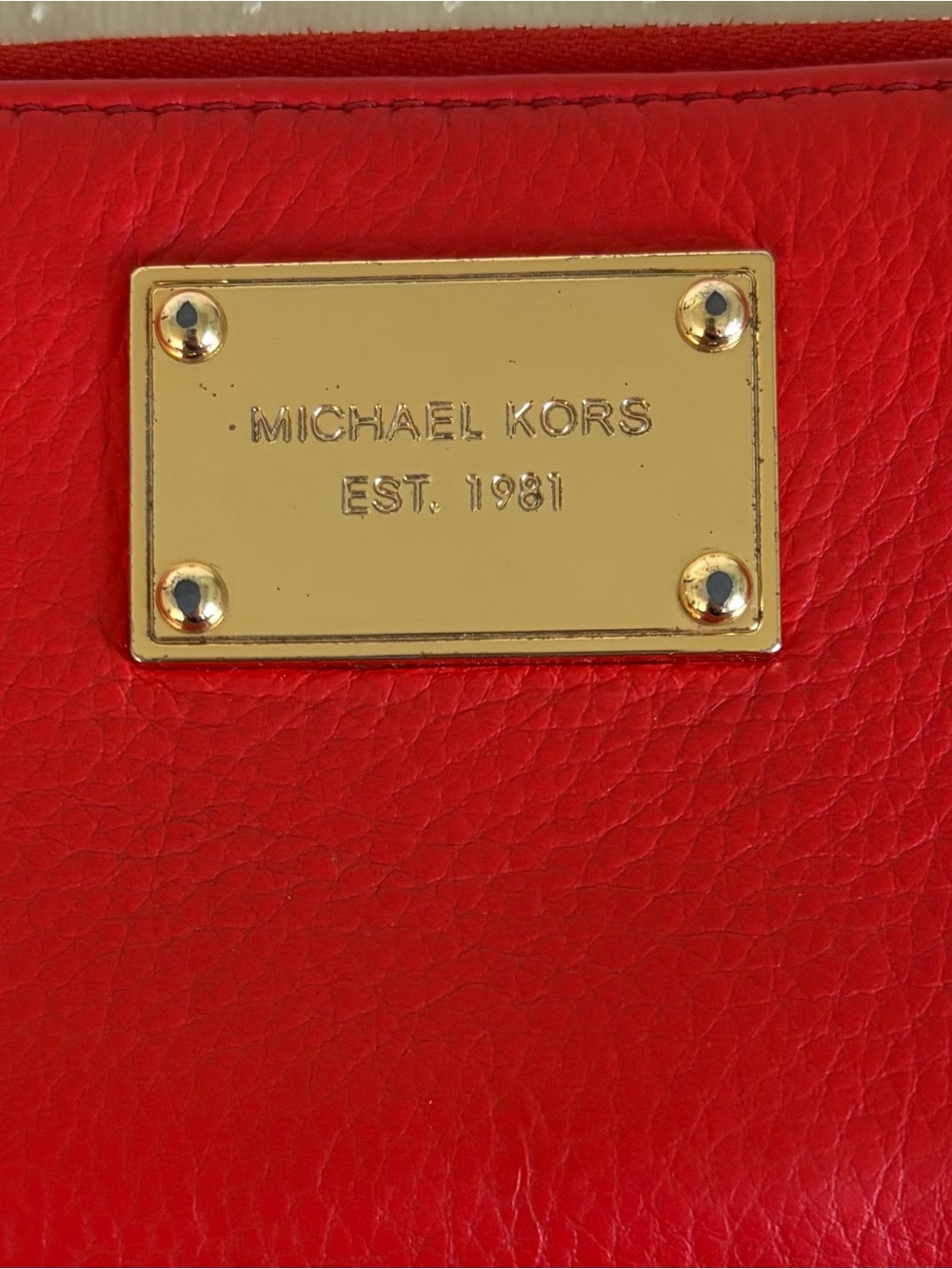 Michael Kors Red Pebbled Leather Wristlet with Gold Plaque - Picture 3 of 10